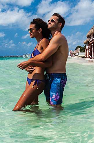 Beautiful couple getaway in the ocean at azul beach resort riviera maya mexico